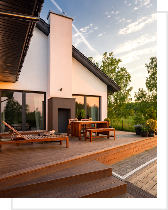 Back patio of a house at sunset